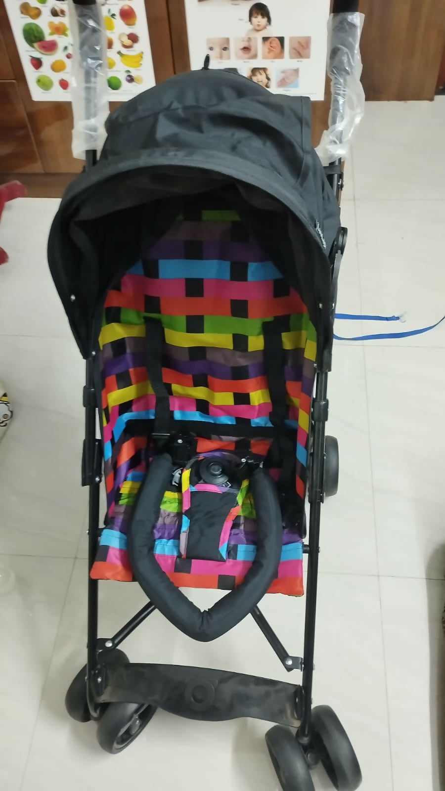 Experience comfort and safety with the LUVLAP Tutti Fruity Stroller/Pram, featuring a reversible handle, adjustable canopy, and three reclining positions for your baby’s needs.