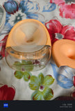 Electric wearable breast pump