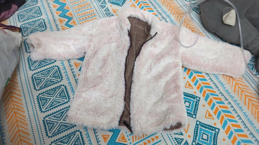 Keep your little one warm and stylish with our adorable woollen jacket, perfect for chilly days and outdoor adventures!