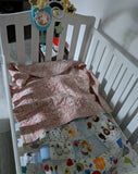 Baby crib/cot with bedding, mattress, side rail padding & fitted sheets – safe and complete sleep set.