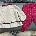 Keep your baby snug during mild chilly days with this soft cotton top and bottom set. 