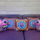 Colorful owl-themed cushions 