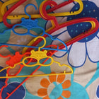 Add a splash of fun and organization to your child's closet with these colorful small hangers, specially designed to hold baby and toddler outfits perfectly. 
