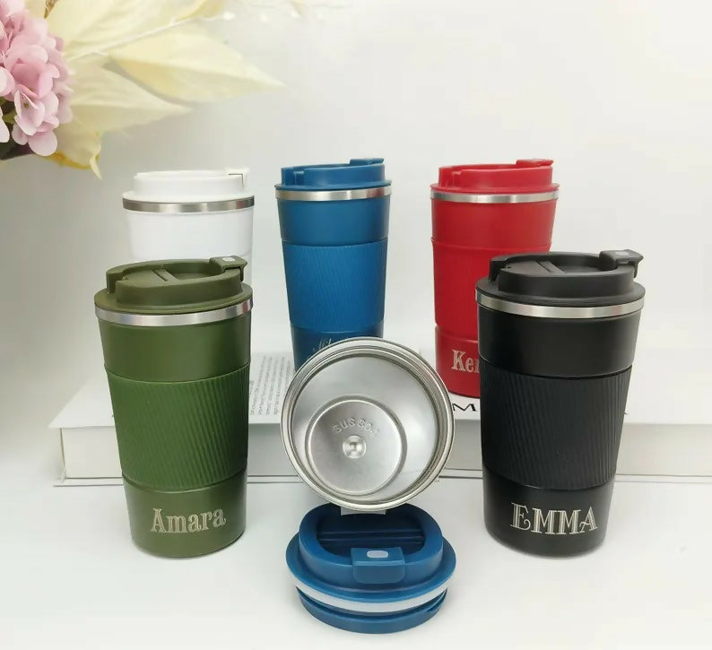 Set of colorful travel mugs with personalized names 