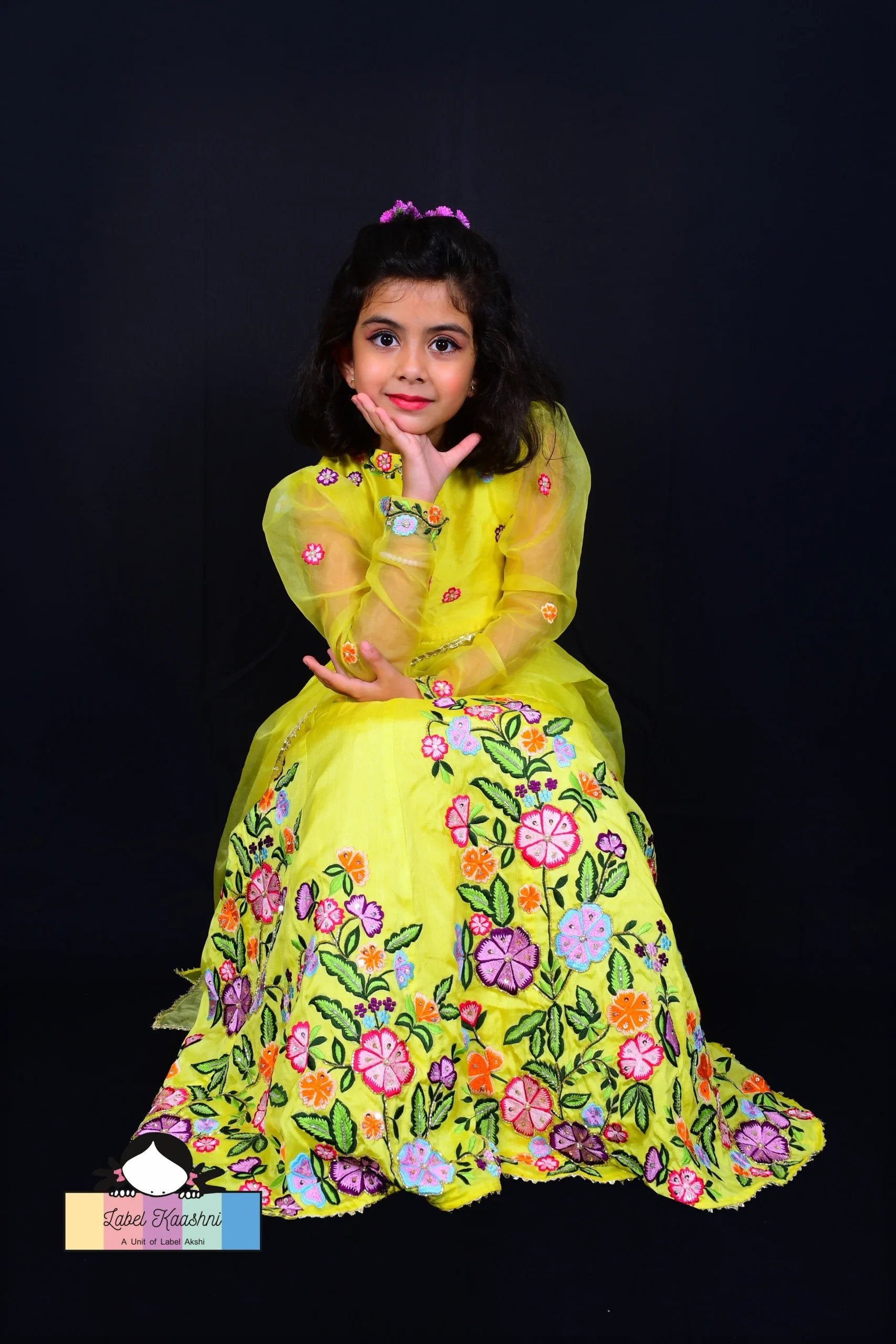 Bring a ray of sunshine to your child's ethnic wardrobe with the Bumblebee Lehenga – a lemon yellow ensemble perfect for festive celebrations and special occasions, designed to add cheer and charm to your little one's look.
