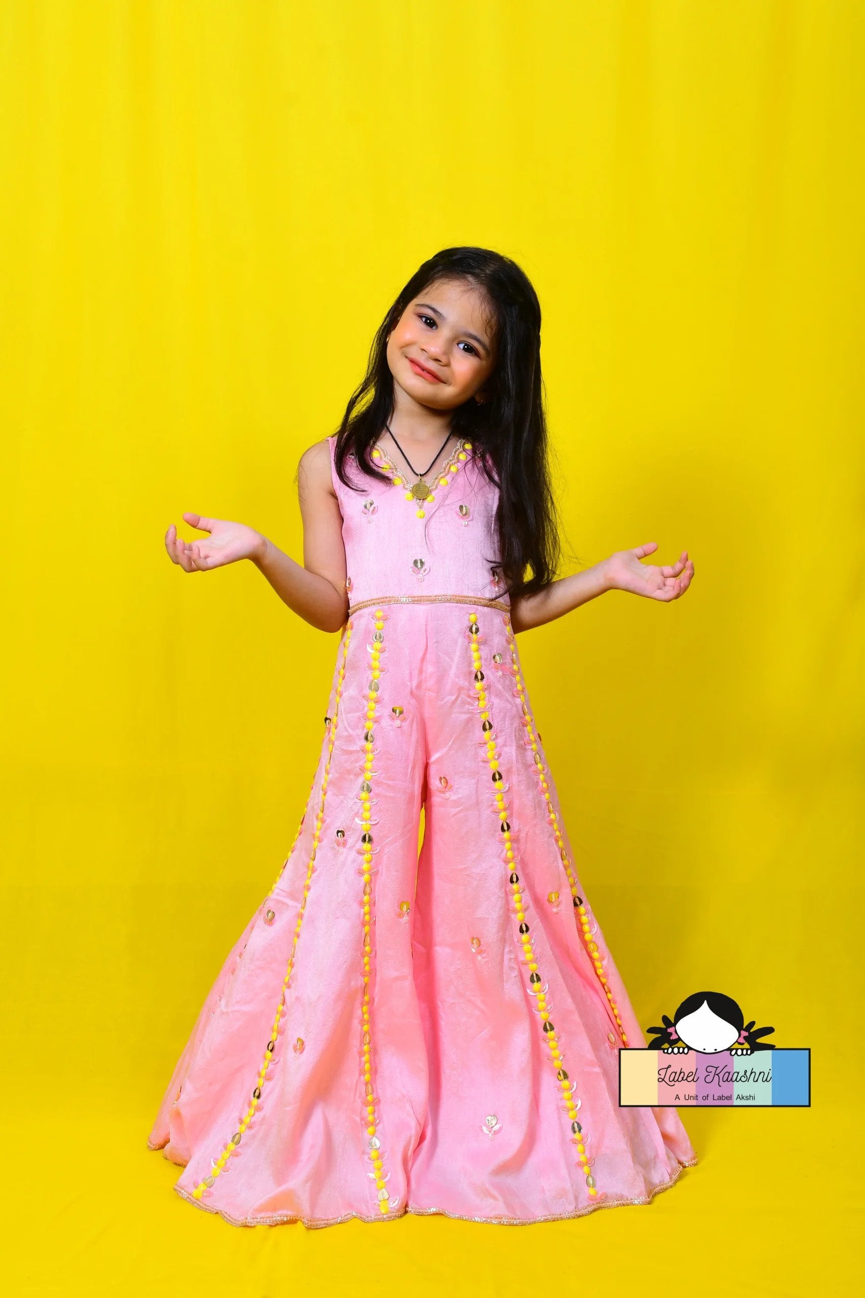 Adorn your child in the adorable Marshmallow Baby Pink Jumpsuit – a perfect blend of comfort and style for any occasion, featuring easy snap buttons and breathable fabric.