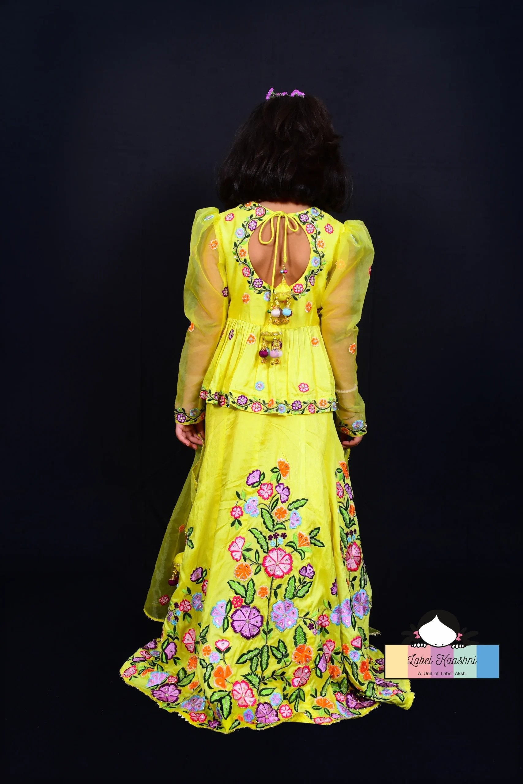 Bring a ray of sunshine to your child's ethnic wardrobe with the Bumblebee Lehenga – a lemon yellow ensemble perfect for festive celebrations and special occasions, designed to add cheer and charm to your little one's look.