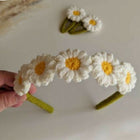 Our collection of headbands and tic-tac clips provides the perfect combination of style and function to complete any hairstyle.