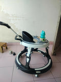 StarAndDaisy 3-in-1 baby walker with parent handle and musical tray, almost new condition