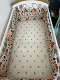 Shop Huny Huny Convertible Baby Cot – Wooden crib with storage, teething rails, wheels, and adjustable height.
