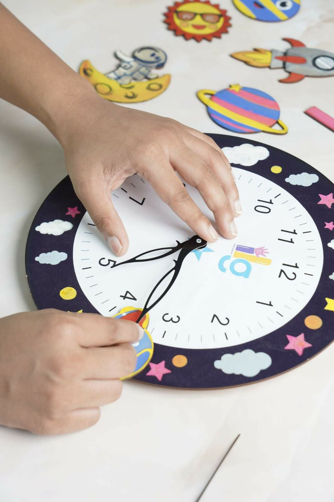 Transform your child's room into a cosmic sanctuary with the Cosmic Creations DIY Space Exploration Clock Kit. 