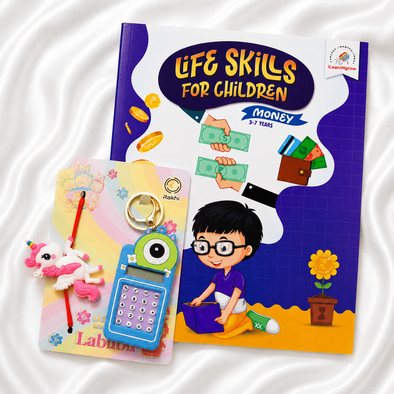 iLearnngrow Financial Literacy Rakhi Combo featuring a festive Rakhi paired with engaging money-learning activities designed to introduce kids to saving, spending, budgeting, and basic financial concepts through play.