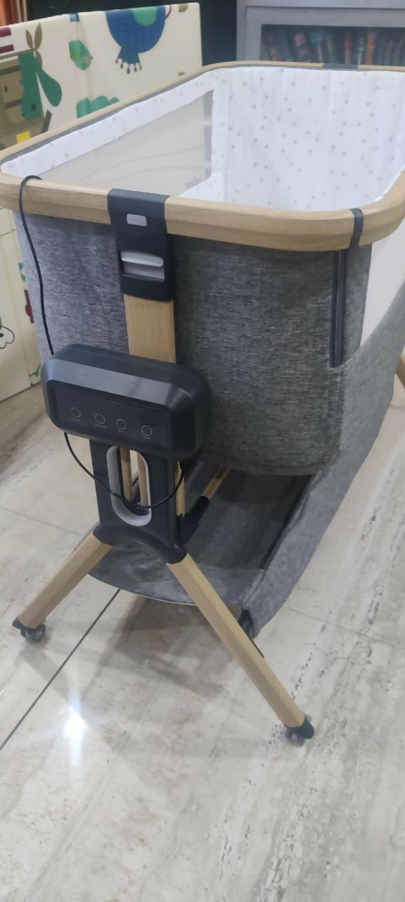 Experience comfort and convenience with the STAR AND DAISY Co-Glide Electric Automatic Cradle Swing, offering gentle gliding motion, adjustable settings, and safety features for a peaceful sleep for your baby.