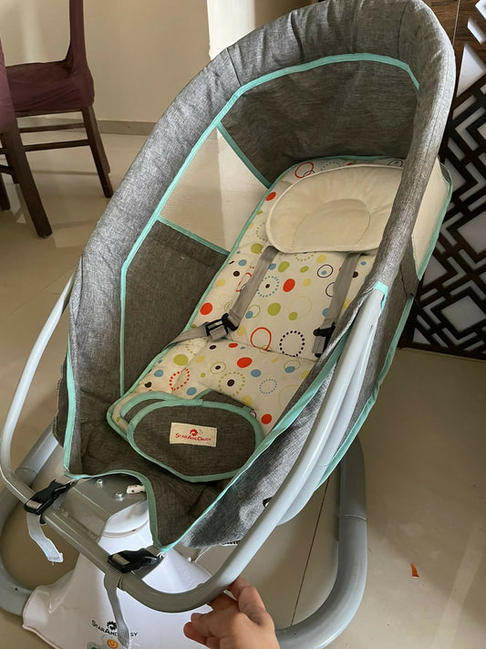 Soothe and entertain your baby with the STAR AND DAISY Electric Bouncer Chair, featuring gentle vibrations and stimulating toys for hours of comfort and fun.