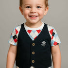 Child wearing a patterned shirt with a navy vest