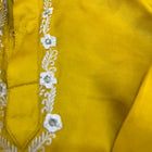 Elegant pure crepe lehenga set for baby girls with hand-thread work and accessories; stylish kurta-pyjama set for baby boys, perfect for festive occasions.