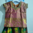 Dress your little girl in luxury and elegance with our Silk Lehenga and Blouse set, perfect for special occasions and celebrations.