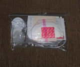 Medical kit with bandages and other supplies on a brown surface