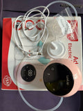 Pink electronic device with digital display on a red and white box