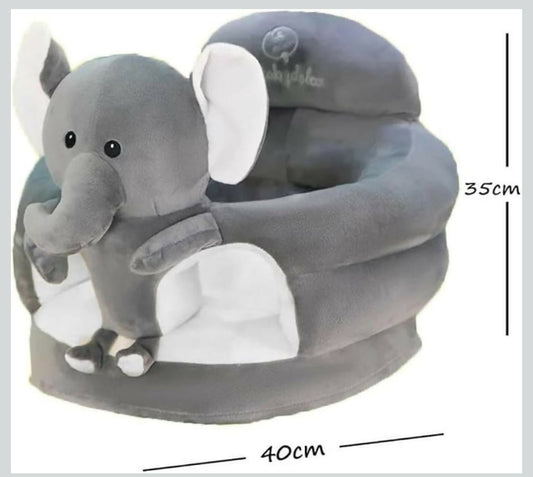 Gray elephant-shaped cushion with measurement details on a white background