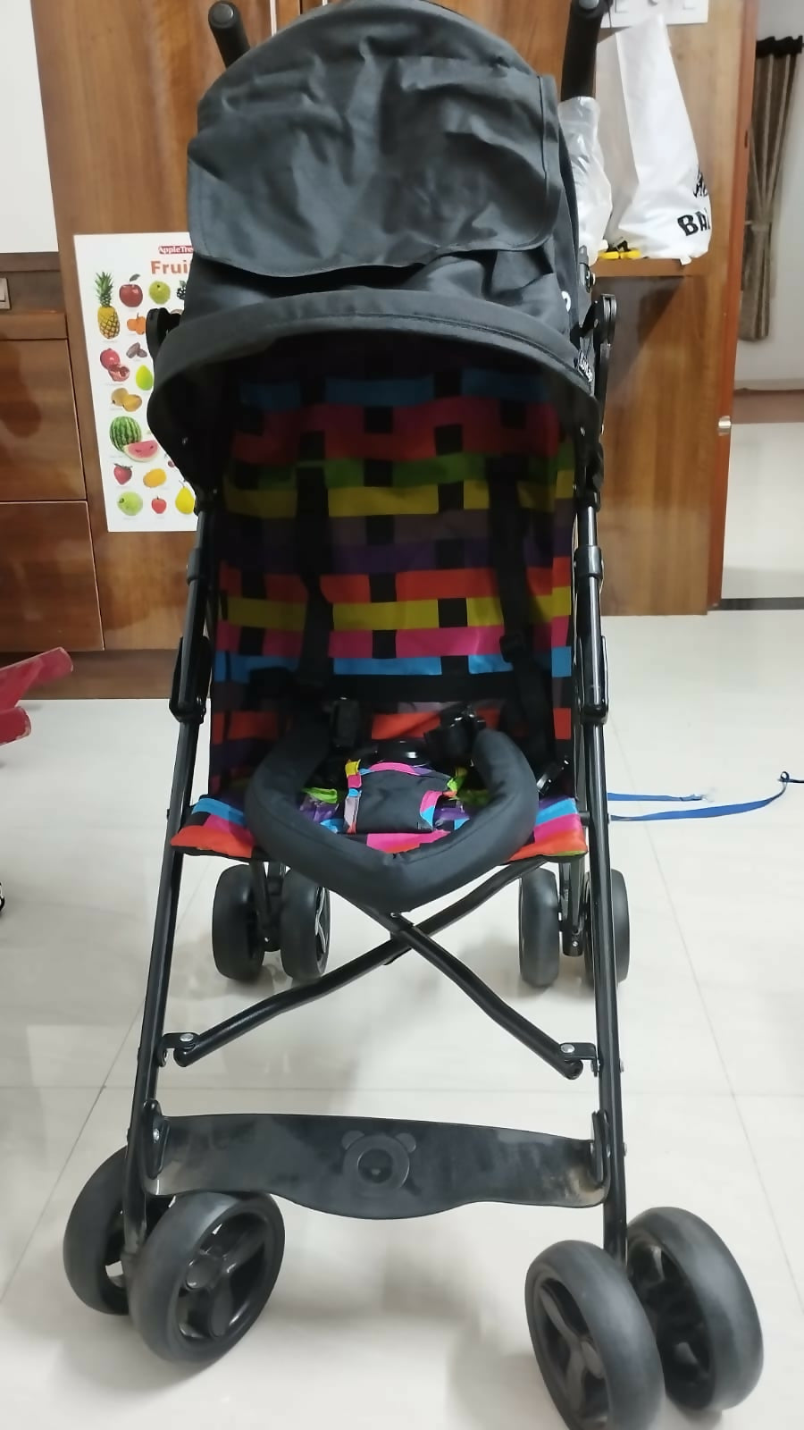Experience comfort and safety with the LUVLAP Tutti Fruity Stroller/Pram, featuring a reversible handle, adjustable canopy, and three reclining positions for your baby’s needs.