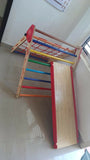 Durable Woodbee Novus Pikler & Slide playset for toddlers, featuring a foldable design, adjustable slide, and high-quality wooden construction.