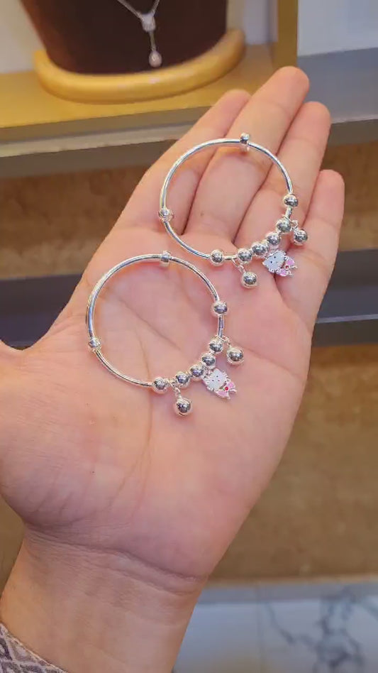 Add a touch of elegance to your baby girl's ensemble with our Silver 92.5 Hallmark Silver Jewelery Bracelets, crafted with exquisite detail and quality sterling silver.