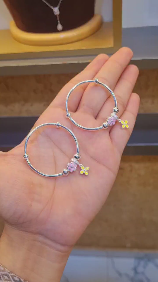 Add a touch of elegance to your baby girl's ensemble with our Silver 92.5 Hallmark Silver Jewelery Bracelets, crafted with exquisite detail and quality sterling silver.