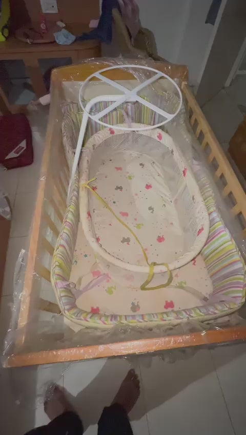 Create a safe haven for your baby with our durable and stylish cot - easy assembly, premium materials, and mosquito net included!