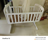 Create a safe and comfortable sleeping space for your baby with the BABYHUG Cradle with Mosquito Net, paired with a BABYHUG Mattress and Mattress Protector Cover. Ensure peaceful nights and worry-free sleep for your little one.