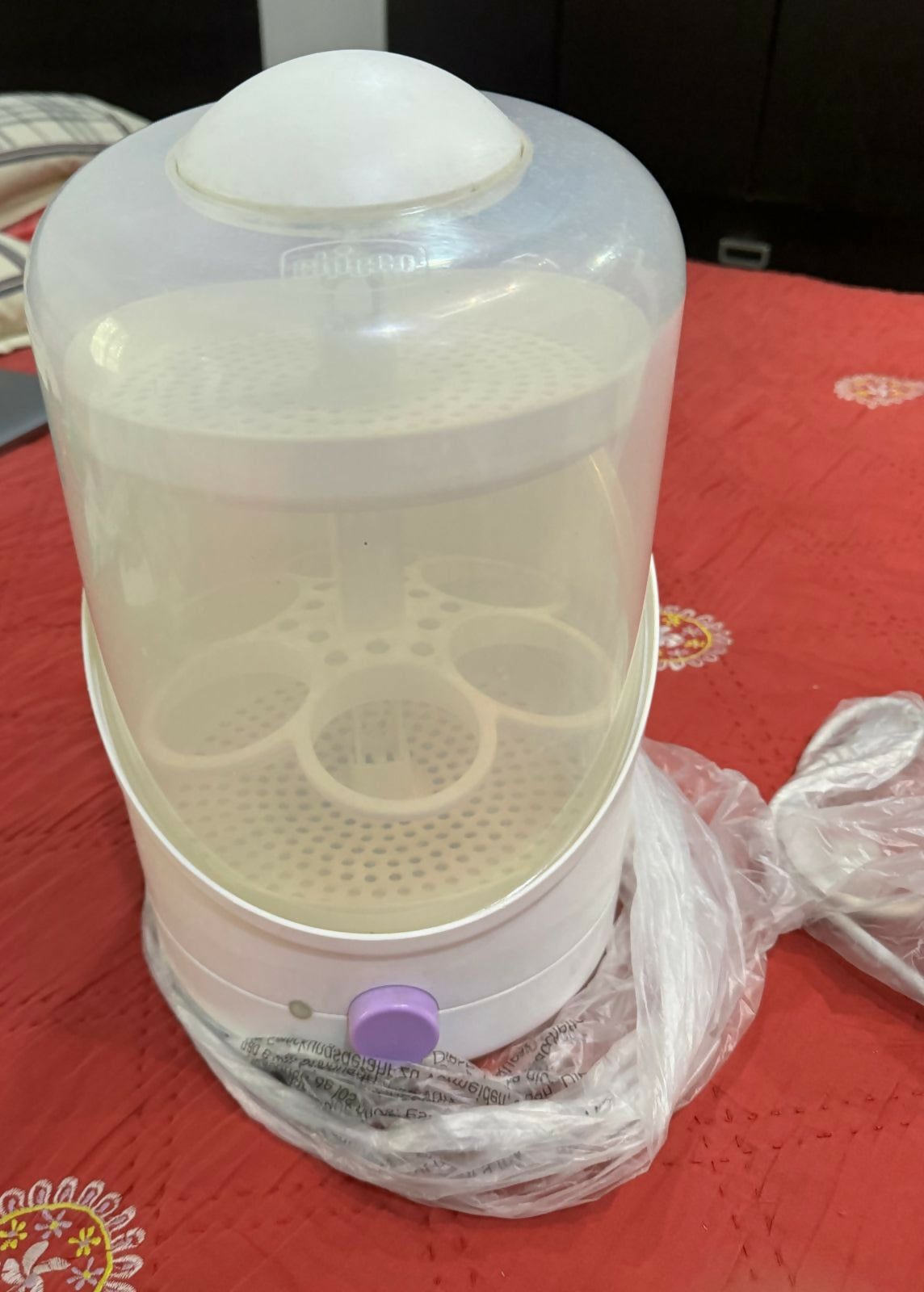 Keep your baby's feeding essentials clean and safe with the CHICCO Baby Steriliser/Sterilizer for Baby, offering efficient steam sterilization for bottles, nipples, pacifiers, and more. With its spacious design and user-friendly controls, it's the perfect addition to any parent's kitchen.