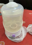 Keep your baby's feeding essentials clean and safe with the CHICCO Baby Steriliser/Sterilizer for Baby, offering efficient steam sterilization for bottles, nipples, pacifiers, and more. With its spacious design and user-friendly controls, it's the perfect addition to any parent's kitchen.