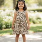 Young girl in a leopard print dress 