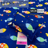 Children's bedsheet set with colorful fish pattern on a blue background, featuring Mokshay branding.