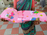 Hoopa 2-in-1 Feeding Pillow – Ergonomic support for feeding and lounging, in a soft baby pink finish.

