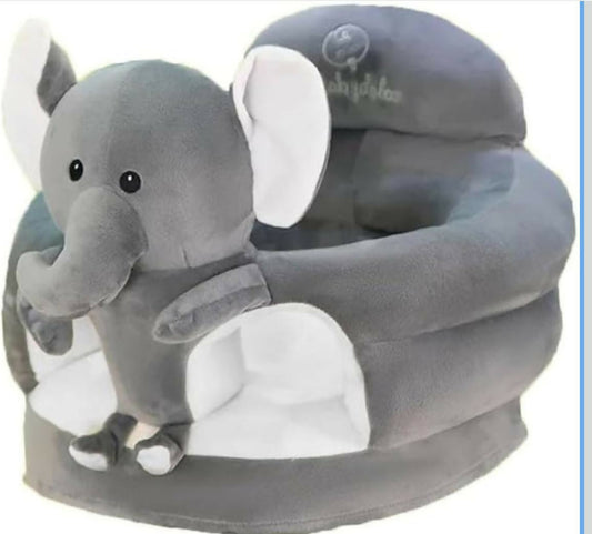 Gray elephant-shaped baby seat with white accents on a blue background