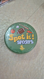 Round green container with 'Spot it! Sports'