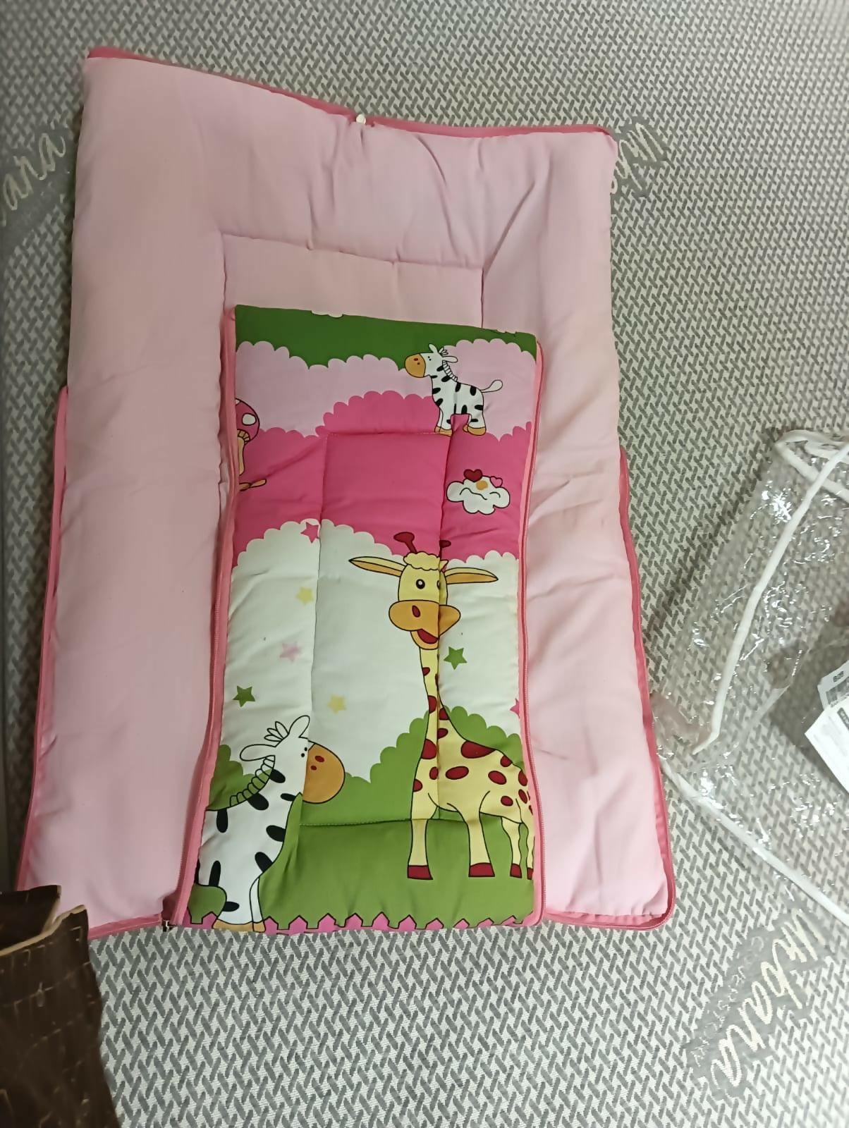 Experience the perfect blend of comfort and convenience with the BABYHUG Sleeping Bag Cum Baby Nest, offering a cozy and secure sleep environment for your little one whether at home or on the go.