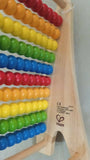 Enhance your child's early learning with the Rainbow Abacus Bead and Alphabet Abacus – combining colorful beads for math skills and alphabet blocks for literacy development in a durable, engaging toy.
