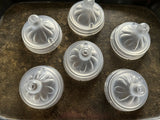 Set of six clear plastic flower-shaped cake pop sticks 