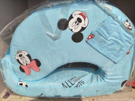 Blue baby seat cover with cartoon character design on a clear background