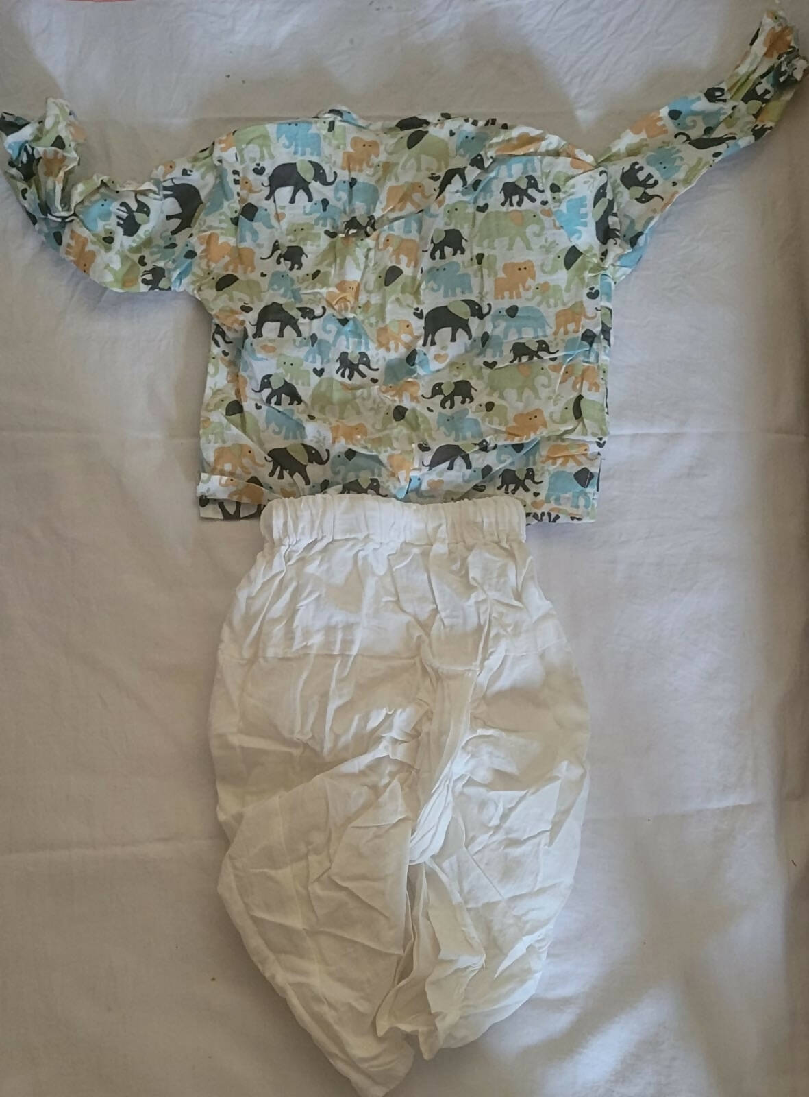 Add a touch of charm to your little prince's wardrobe with the Polka Dots Baby Boy Kurta Dhoti - perfect for festive celebrations and special occasions!