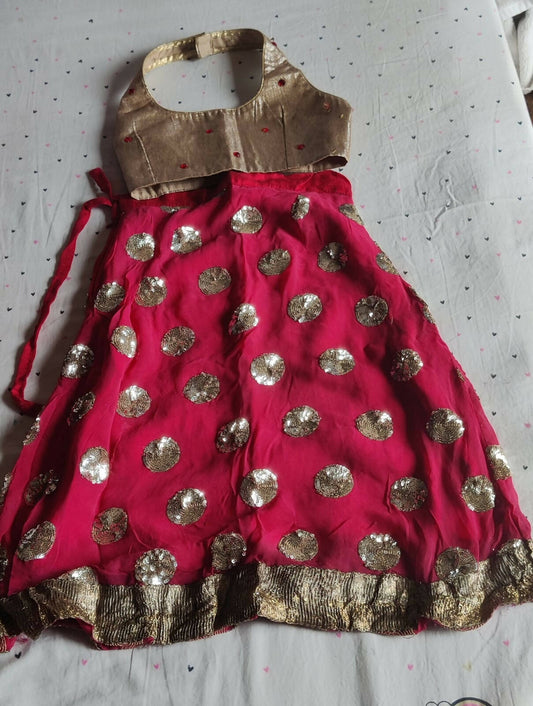 Elevate your baby girl's style with the Crop Top with Lehenga—a fashionable ensemble that combines comfort and charm for your little fashionista.