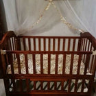 Create a safe and cozy haven for your little one with our Cot/Crib - where sweet dreams begin!