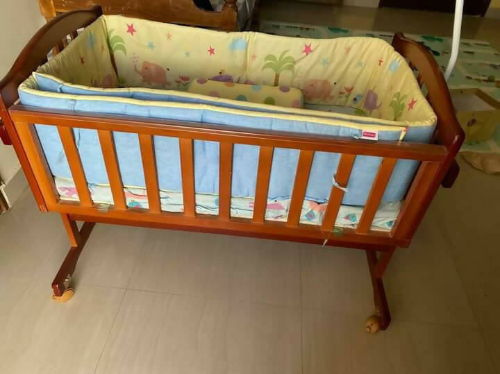 Introducing the BABYHUG Cradle with Mosquito Net and Mattress—a complete sleep solution for your little one's comfort and safety.