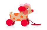 The wooden pull along dog, an adorable and classic children's toy, designed to encourage early mobility and imaginative play - PyaraBaby