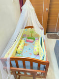 Introducing the BABYHUG Cradle with Mosquito Net and Mattress—a complete sleep solution for your little one's comfort and safety.