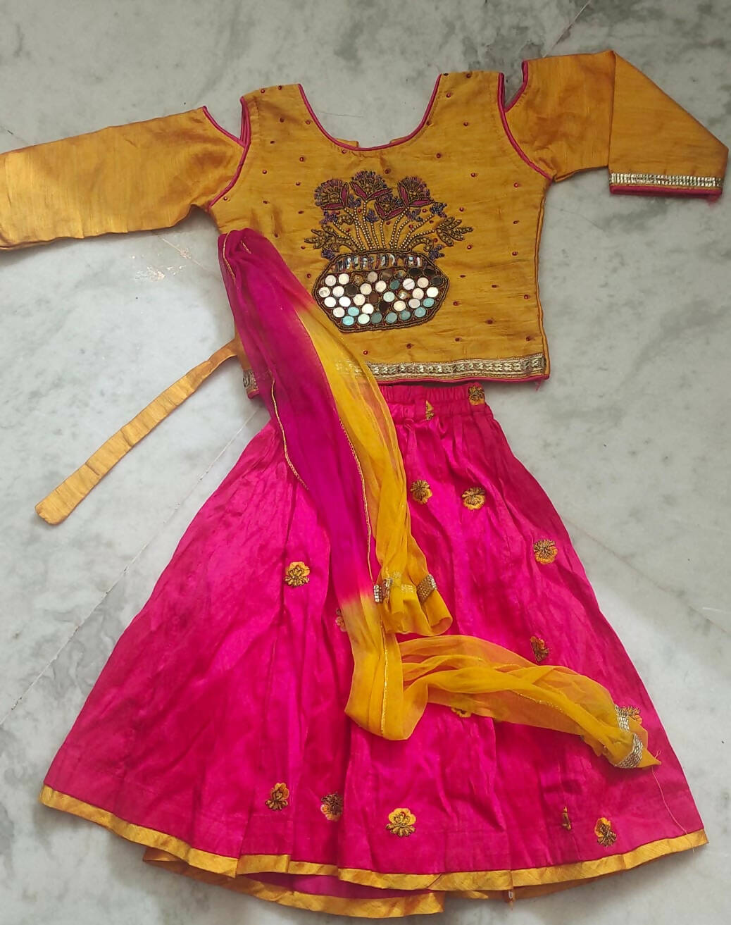 Elevate your baby girl's style with our stylish Lehenga Choli and Dupatta Set - a perfect choice for festive occasions and celebrations!